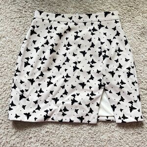 PRINCESS POLLY HIGH WAISTED MINI SKIRT WITH SLIT